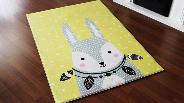 Children's carpet with bunny design on a yellow background, ideal for brightening play areas.